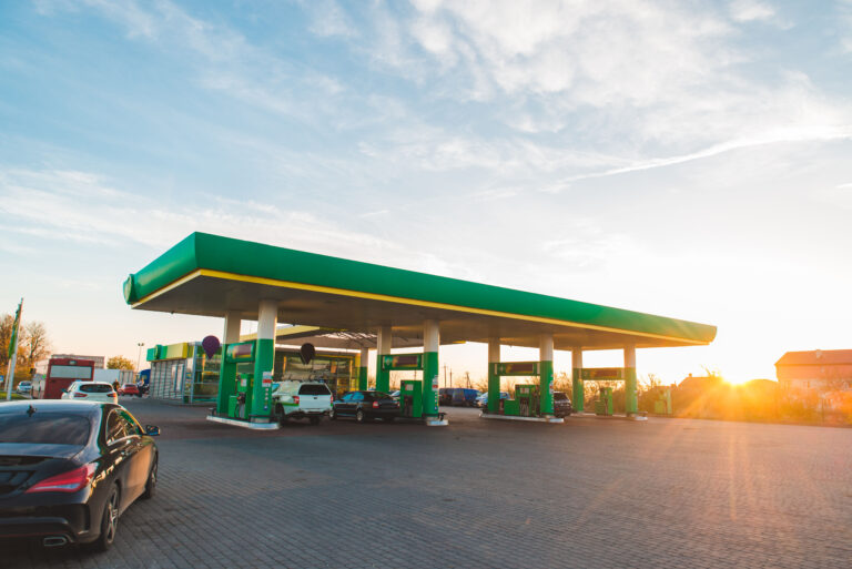 Wide view of gas station on sunset